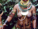 67 Tribal woman beating her drum at a sing Sing 800