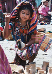 36 Inspecting potttery in the market outside of Quetzaltenango 800