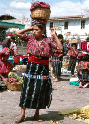 42 Woman carrying her goods on her head in Chichicastenango 800