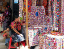 47 Seller of textiles in Panajchel central market 800