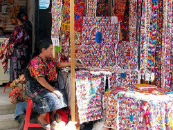 47 Seller of textiles in Panajchel central market 800