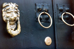 45 shiny brass lion head photgraphed in antigua  guatemala 800
