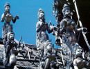 9 wooden statues on the roof of buddhist temple 800