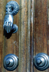 30 Hand shaped brass knocker photographed in Quetzalatenango  Guatemala 800
