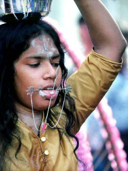 7 Tamil woman carrying a pail of milk 800