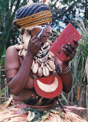 45 Tribal woman putting on her makeup 800