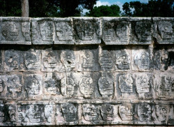 12 wall of mayan faces in the tulum ruins in mexico